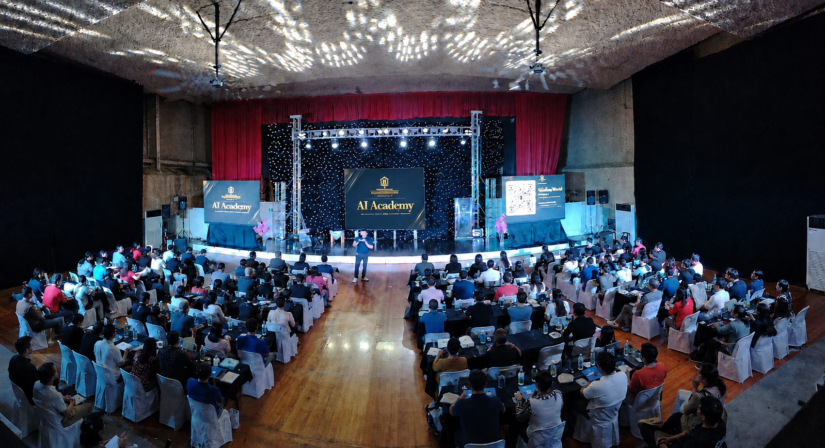 Wide view of the theatre during an AI Academy session